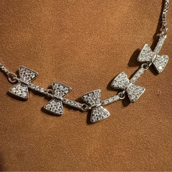 NWOT Kite Tail Bows 18K White Gold Plated CZ Box Chain Lariat Bracelet - Picture 3 of 3